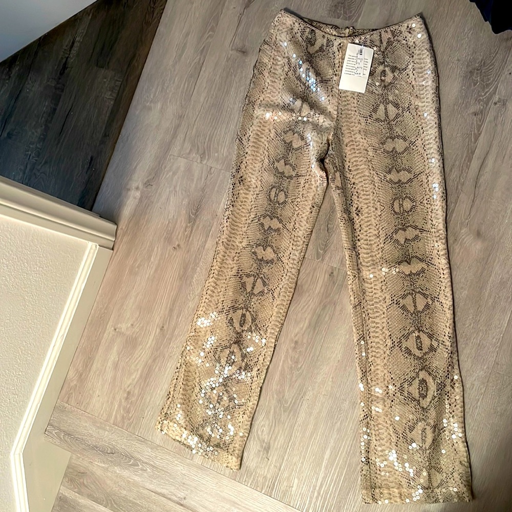 100% silk, brand new with tags, shiny snakeskin pants from White House.